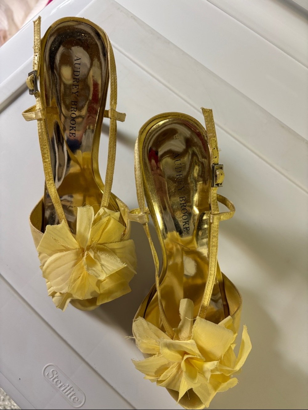 Audrey Brooke Gold T-Strap Heels with Yellow Floral Accents